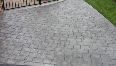 Cobblestone style driveway made from stamped concrete.